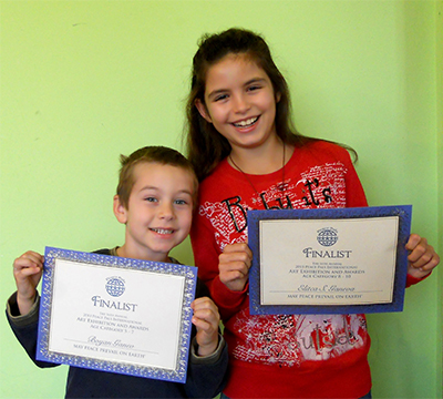 Boyan Ganev (left) age 5 and Elitca Ganeva (right) age 10 both Finalist from Bulgaria