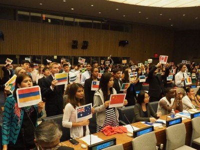 Students with UN Member Paper Flags