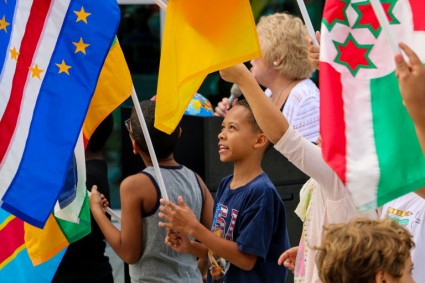 students-raise-flags