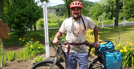 Nepalese man pedaling around the world for peace revisits The World Peace Sanctuary – USA